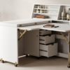 Bureau blanc pliable avec étagères de rangement.